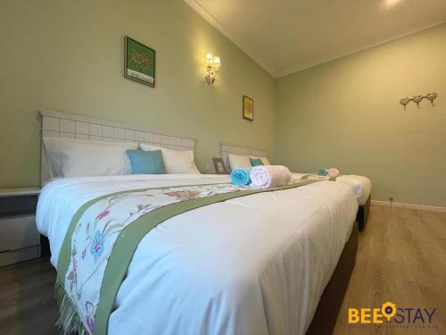 Postel nebo postele na pokoji v ubytování Cheng Landed Villa in Taman Bertam Setia Melaka