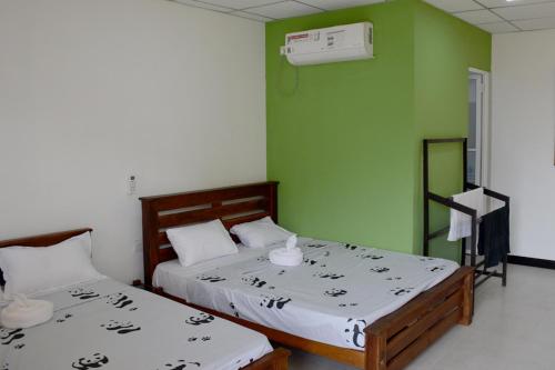 Postel nebo postele na pokoji v ubytování Paramata Accommodation