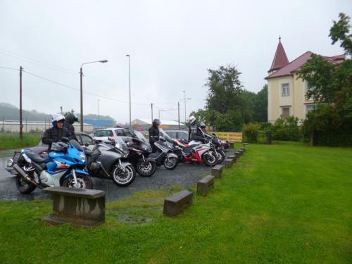 a group of motorcycles parked in a parking lot at Pension Villa Else in Heidenau