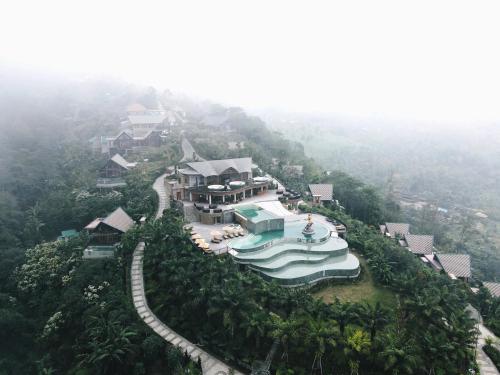 an aerial view of a resort on a mountain at Elevate Bali in Munduk