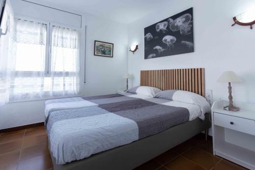 Posteľ alebo postele v izbe v ubytovaní PRIMERISIMA LINEA DE MAR. HUTG 038644-53
