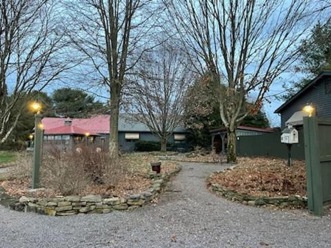 a yard with a house and a driveway at Deer Creek Winery at Watson Estate in Uniontown