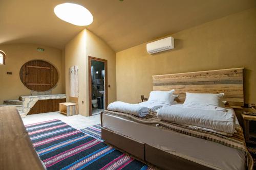 Ένα ή περισσότερα κρεβάτια σε δωμάτιο στο Glamping Alliance Hotel