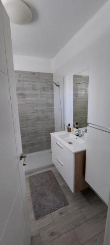 Koupelna v ubytování Sand Club Family