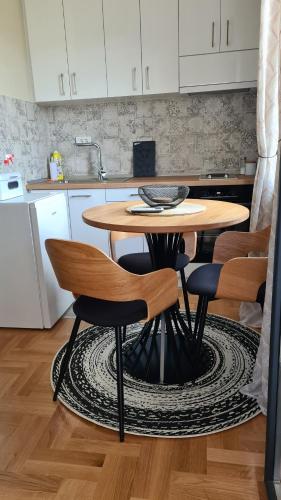 Kuchyň nebo kuchyňský kout v ubytování MS Apartman