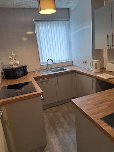 Η κουζίνα ή μικρή κουζίνα στο 1 Bed Apart