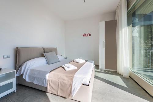 Residence Virgilio Redにあるベッド