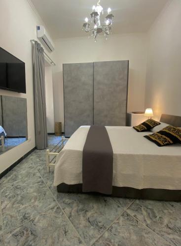 Postel nebo postele na pokoji v ubytování Suite Incentro Salerno
