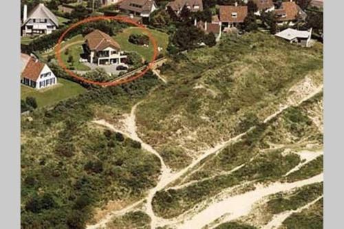 an aerial view of a house on a hill at Amazing VILLA with Exceptional Panoramic views over Dunes protected natural site and Sea - Entire House or apt in Le Touquet-Paris-Plage