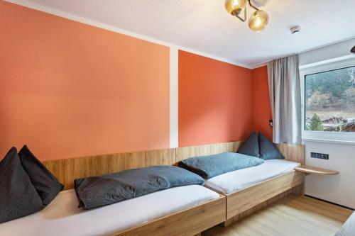 Ein Bett oder Betten in einem Zimmer der Unterkunft Luisalle Top 4