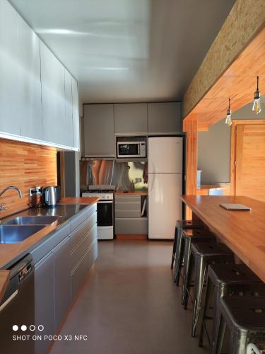 Una cocina o zona de cocina en Arrayanes