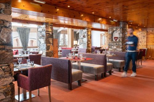 Posezení v ubytování Hôtel L'Aiguille Percée