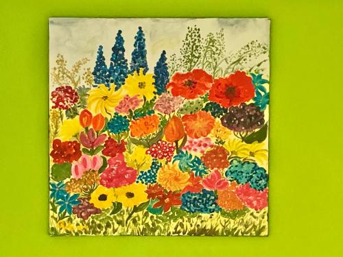 a painting of a bunch of colorful flowers at Haus am Kurpark in Schömberg