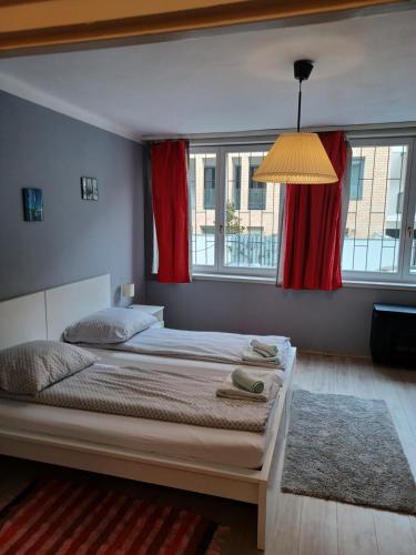 Posteľ alebo postele v izbe v ubytovaní Benkoapartments