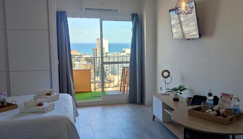 Posteľ alebo postele v izbe v ubytovaní NORDIC SUITE Apartamentos Minerva NEW APARTMENT Vistas al Mar