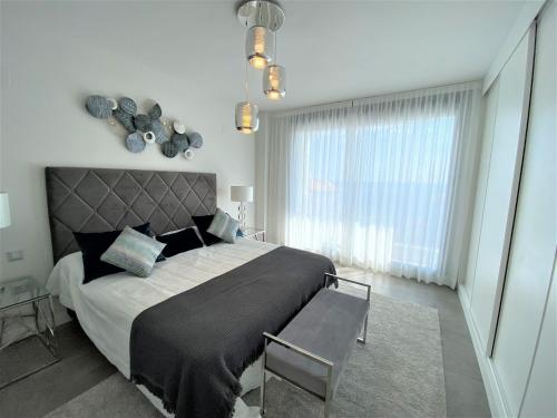 Postel nebo postele na pokoji v ubytování Prestigious apartment with seaview in Manilva