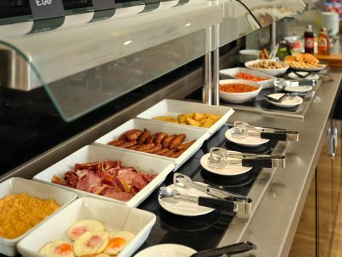 a buffet line with many different types of food at Linton Lodge a BW Signature Collection Hotel in Oxford