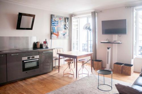 Fotografia z galérie ubytovania Cosy apartment near the Palais Garnier v Paríži