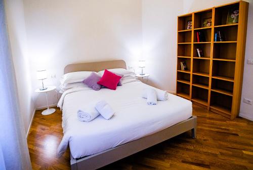 Postel nebo postele na pokoji v ubytování Acacia Firenze - Avocado
