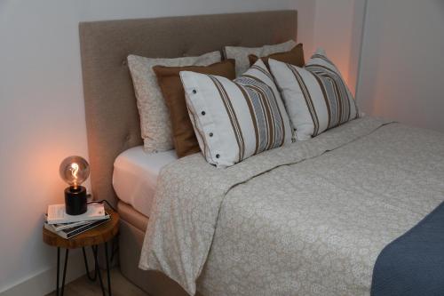 Postel nebo postele na pokoji v ubytování Casa Rosas do Mondego