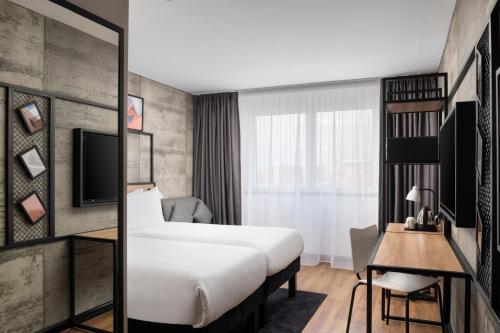En eller flere senge i et værelse på ibis London Earls Court