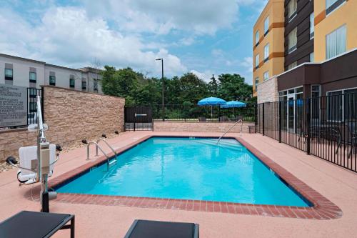 a swimming pool in the middle of a building at Fairfield Inn & Suites by Marriott Dublin in Dublin