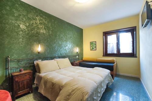 Giường trong phòng chung tại B&B Home Holiday Villa delle Acacie agriturismo