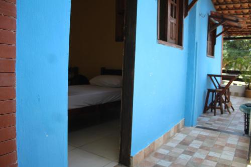 Postel nebo postele na pokoji v ubytování ROSÁRIO TEMPORADA Hostel