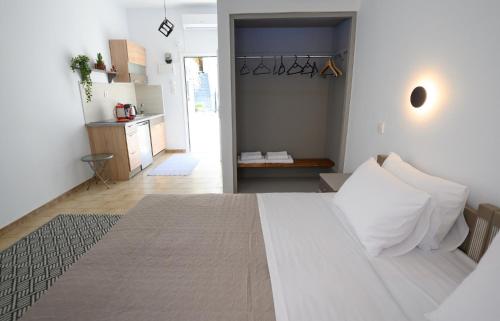 Ένα ή περισσότερα κρεβάτια σε δωμάτιο στο Verano Apartments