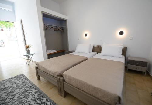 Ένα ή περισσότερα κρεβάτια σε δωμάτιο στο Verano Apartments