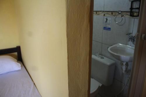 Koupelna v ubytování ROSÁRIO TEMPORADA Hostel