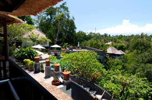 a view from the balcony of a resort with plants at Ubud Dedari Villas in Ubud