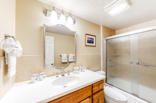 a bathroom with a sink and a shower at Island Surf 601A in Kihei