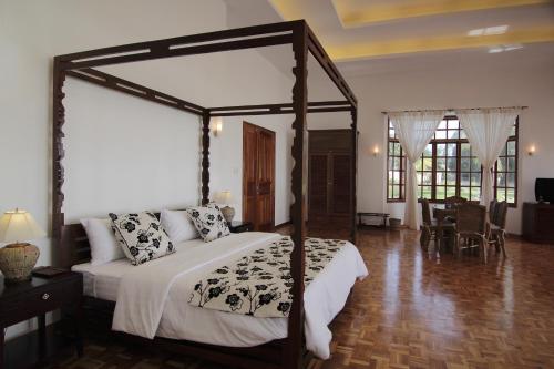 Un pat sau paturi într-o cameră la Sea Dream Resorts