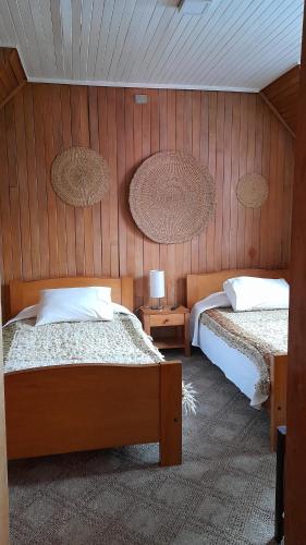 Un ou plusieurs lits dans un hébergement de l'établissement Hotel Unicornio Azul