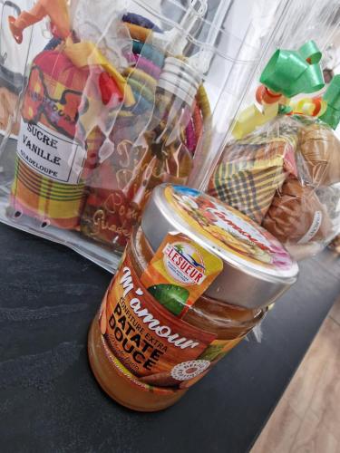 a container of food sitting on top of a refrigerator at Bella vista house 971 in Le Gosier