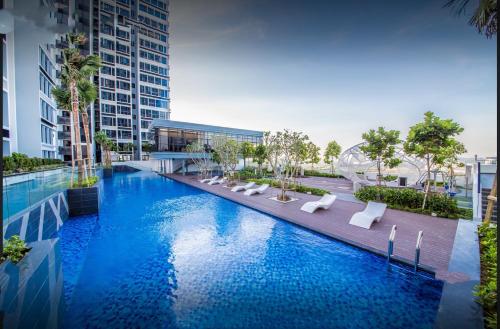 an image of a swimming pool in a building at Duplex Town House at EcoBotanic Near Legoland with Netflix and KTV System in Nusajaya