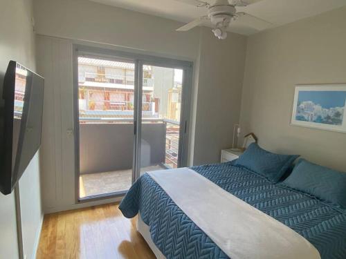 Una cama o camas en una habitación de Cozy 1-bedroom apartment in the heart of V.Urquiza