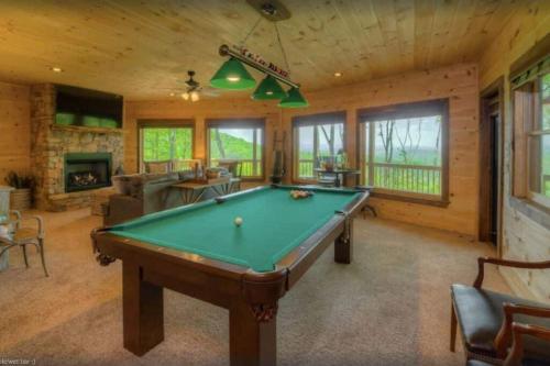 a billiard room with a pool table in a house at Sky High Lodge - Blue Ridge in Blue Ridge