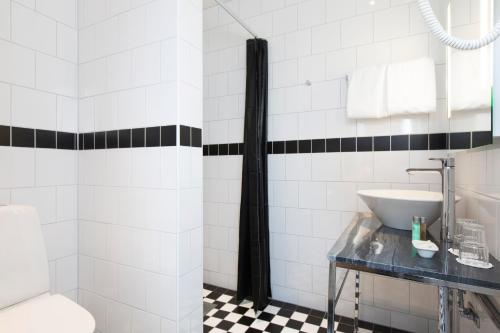 Ett badrum på Elite Stadshotellet Karlstad