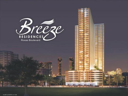 a picture of a city with a large building at SMDC Breeze Residences in Manila