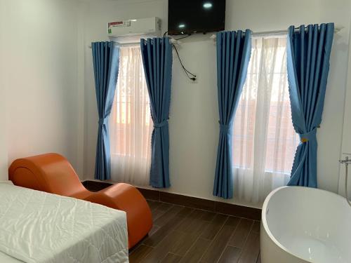 Ένα ή περισσότερα κρεβάτια σε δωμάτιο στο Hotel MAI TUAN Nguyễn Văn Linh