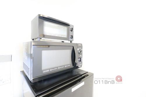 NK BLD3F Sapporo 3LDK 3BR 1 floor 1 roomにあるキッチンまたは簡易キッチン