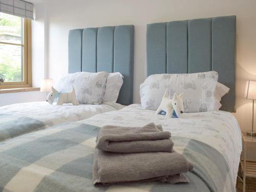 Cama o camas de una habitación en Manor Lodge Stables
