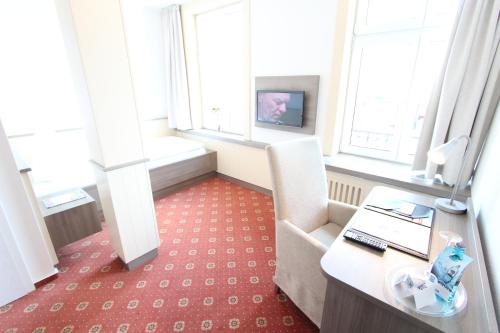 TV a/nebo společenská místnost v ubytování Hotel Thormählen