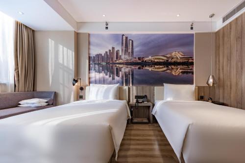 Atour Hotel Changsha IFC Centerにあるベッド