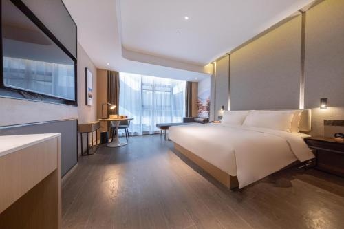 Katil atau katil-katil dalam bilik di Atour Hotel Chengdu High-tech Tianfu 2nd Street