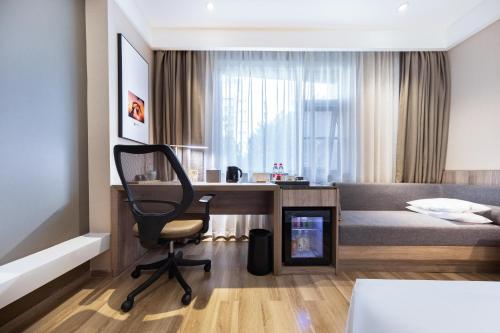Atour Hotel Changsha IFC Centerにあるベッド