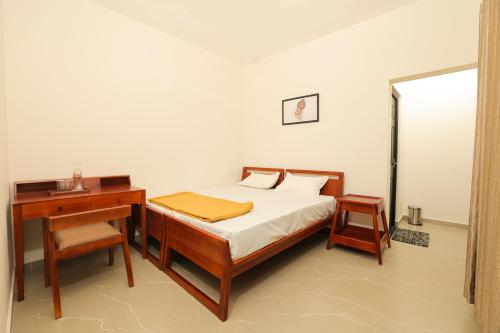Postel nebo postele na pokoji v ubytování eCASA Home Stay
