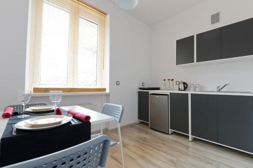 Кухня или мини-кухня в Apartament Wały Chrobrego
